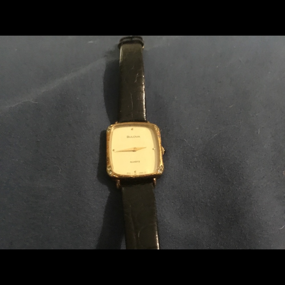 Bulova quartz ladies watch with leather band.